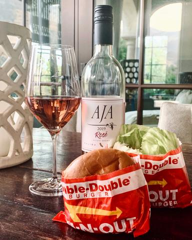 A glass of AJA Vineyards wine