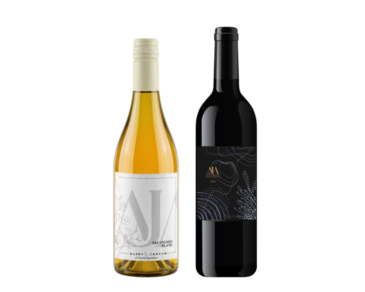 A bottle of AJA Sauvignon Blanc and a bottle of AJA Cabernet Sauvignon
