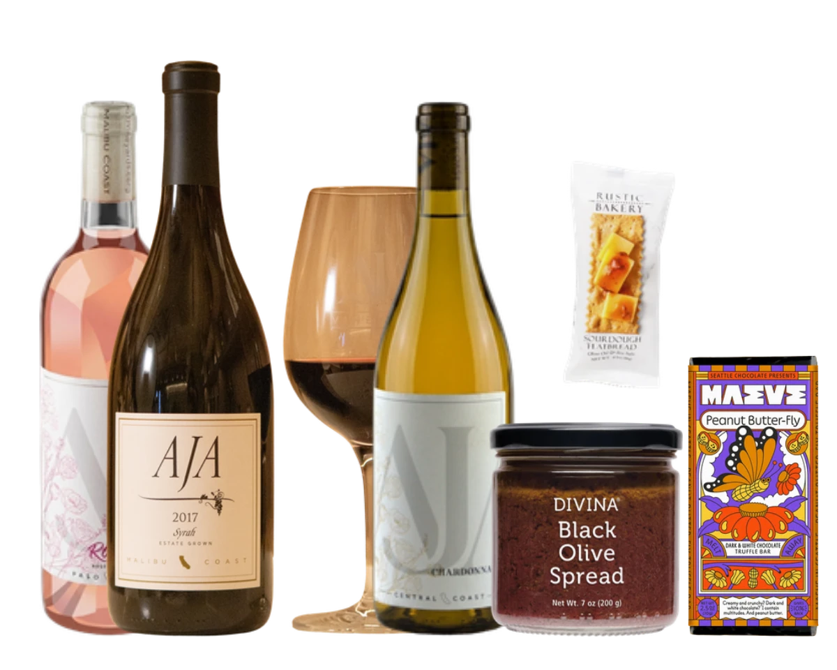 AJA Rosé, Syrah, and Chardonnay with crackers, black olive spread, and a chocolate bar